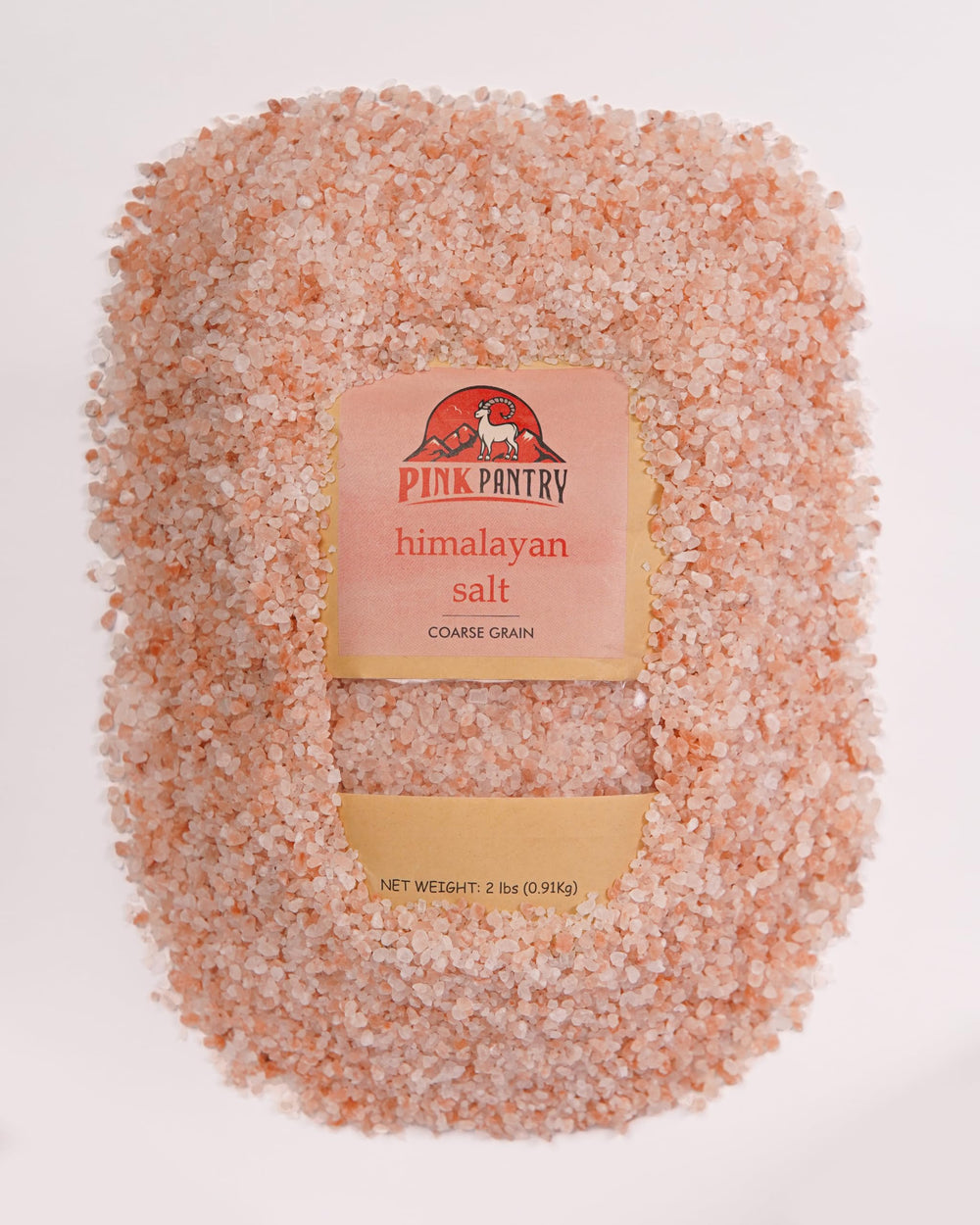 Pink Pantry salt close-up reveals pink hue and mineral specks.