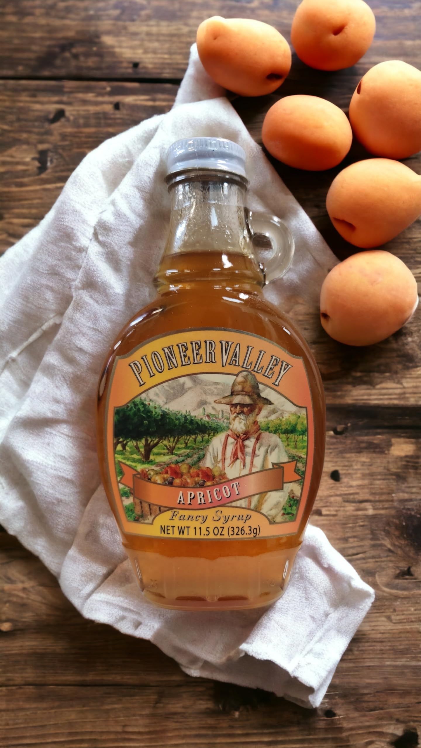 Pioneer Valley Apricot Pancake Syrup ingredients closeup showing apricots and honey.