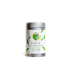 PIQUE Sun Goddess Matcha tin, vibrant ceremonial-grade powder for calm focus and energy.