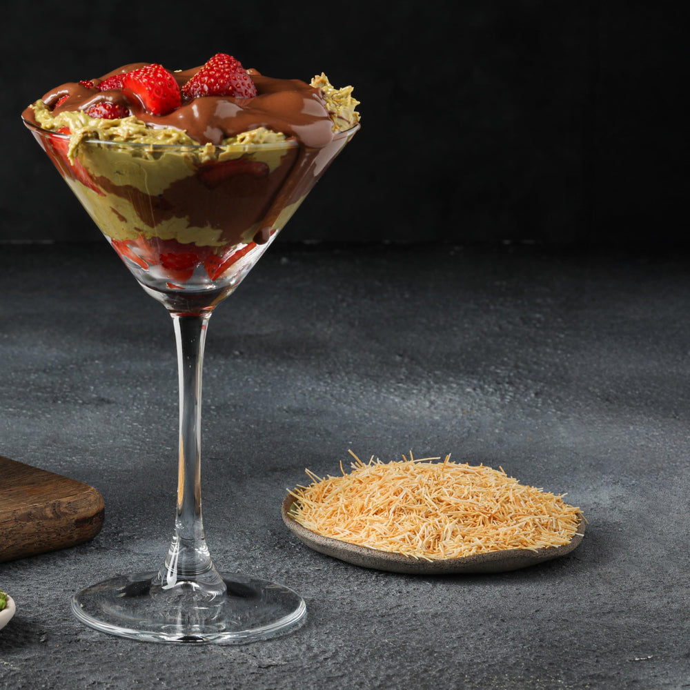 Pistachio cream dessert with kataifi for a luxurious flaky bite.