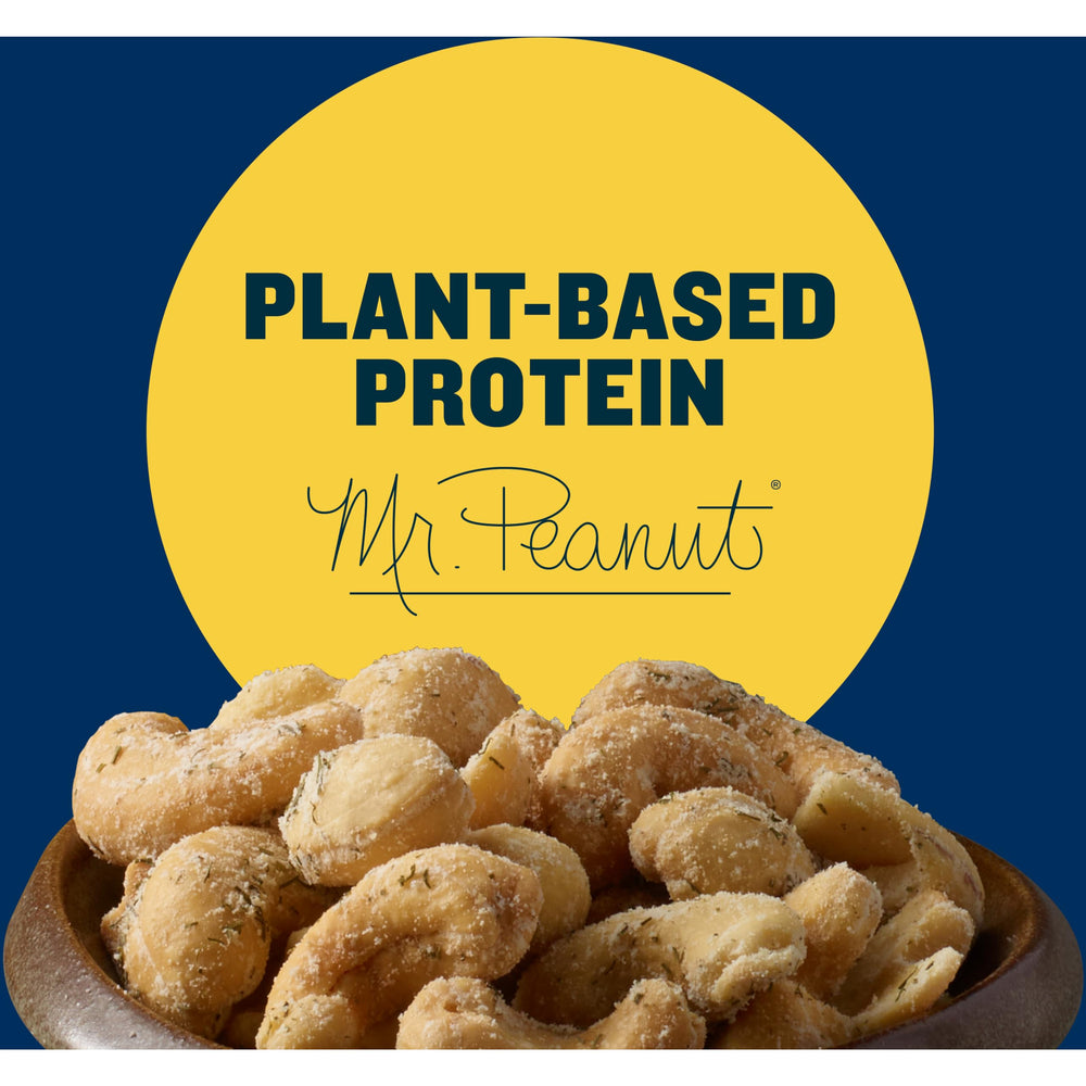 Planters Cashews Dill Pickle snack pack on table, ideal for travel and office breaks