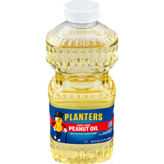 PLANTERS Peanut Oil bottle on kitchen counter ideal for frying and sautéing.