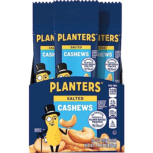 PLANTERS Salted Cashews on a desk for quick office snacking