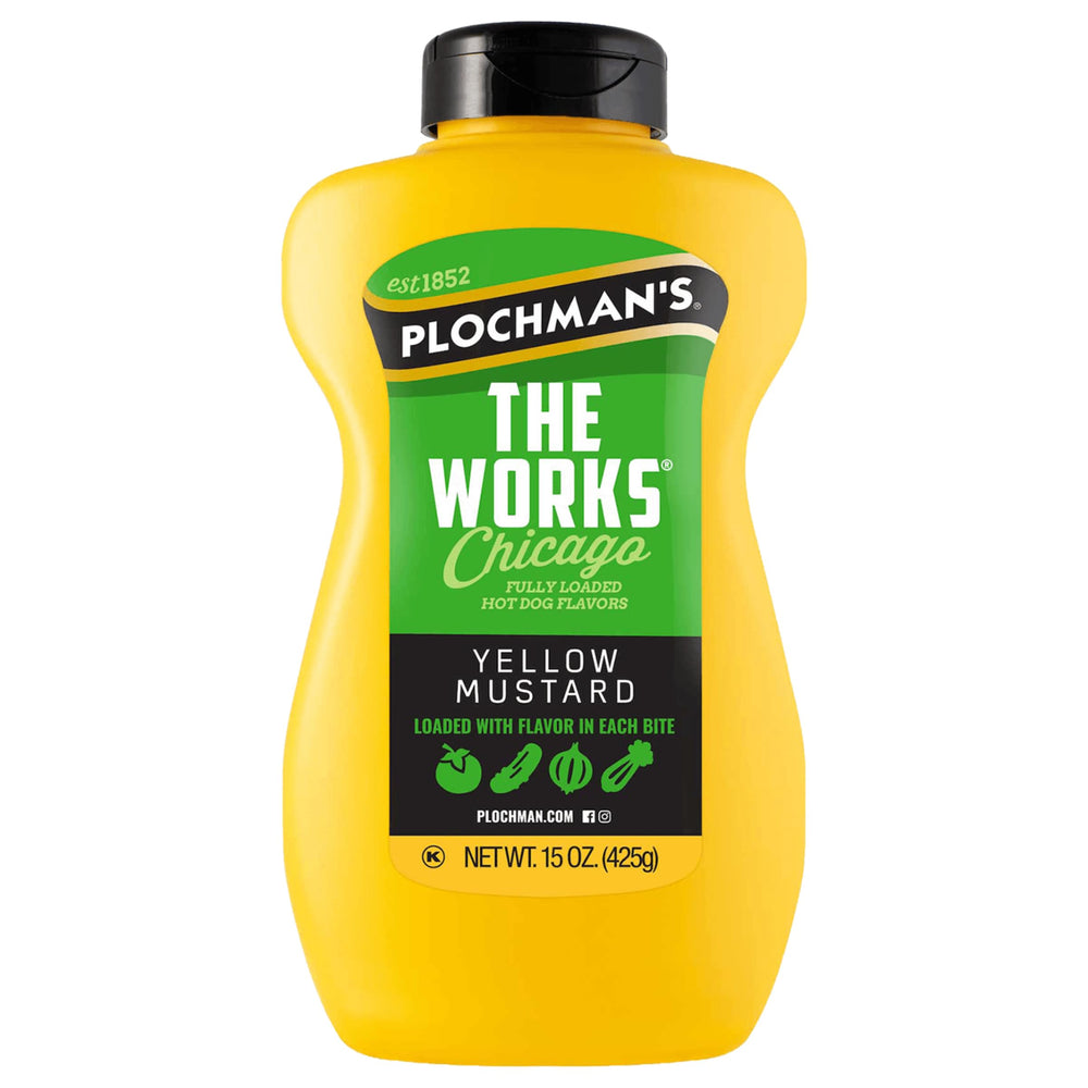 Plochman's The Works Mustard 15oz bottle pouring onto a Chicago-style hot dog.