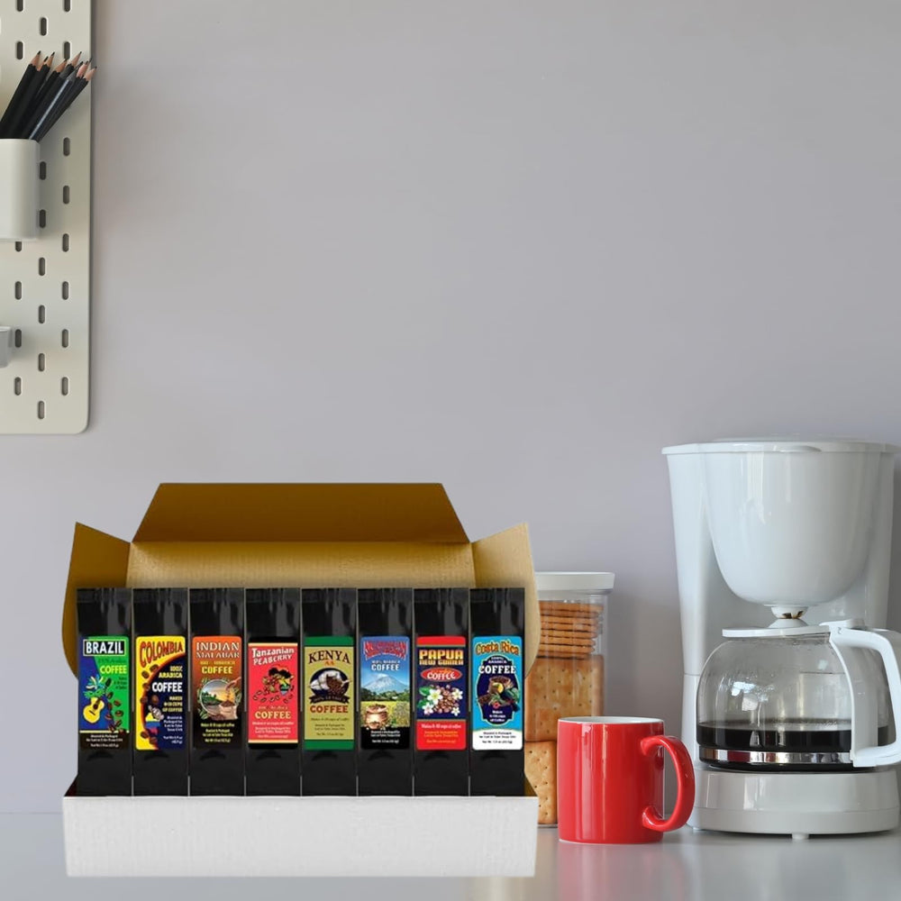 Plum Nellie gift box opened to reveal assorted single-origin coffee grounds.