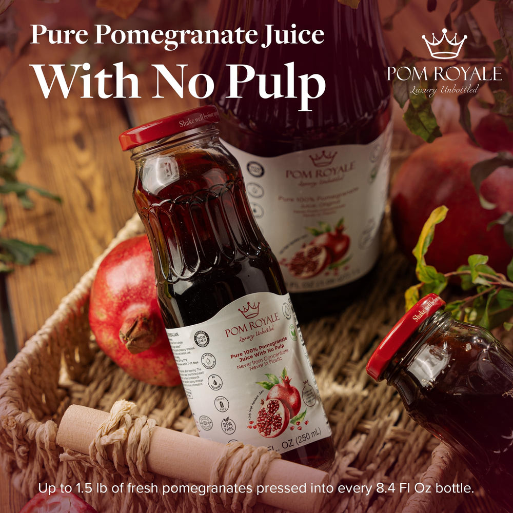 Close-up of Pom Royale bottle label emphasizing cold-pressed not from concentrate quality