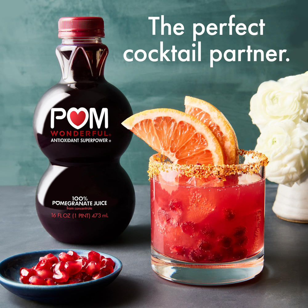 POM Wonderful 100% Pomegranate Juice bottle on kitchen counter, convenient 2-pack.