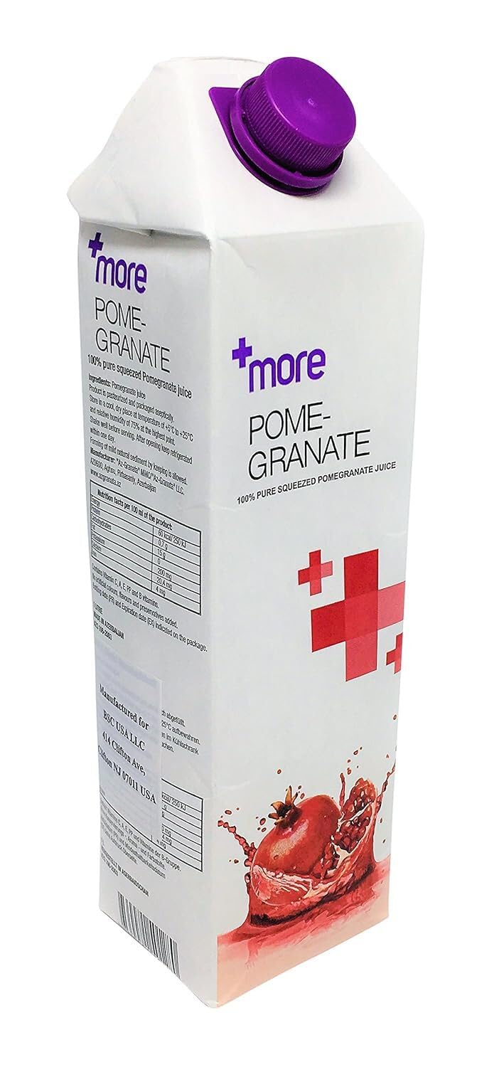 Pomegranaze juice pour into glass highlighting vibrant flavor