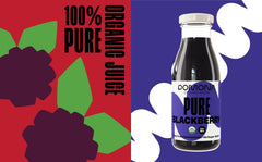 Pomona Organic Blackberry Juice pouring into glass for a refreshing sip