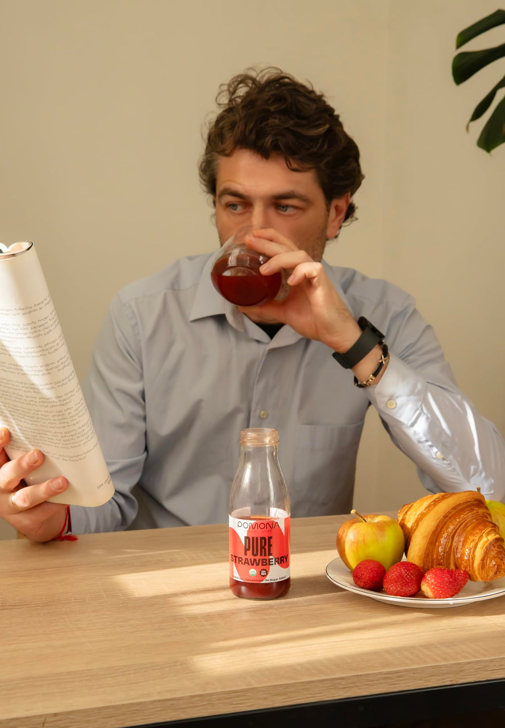 Pomona Organic Strawberry Juice glass bottle on counter; everyday meals and quick drinks