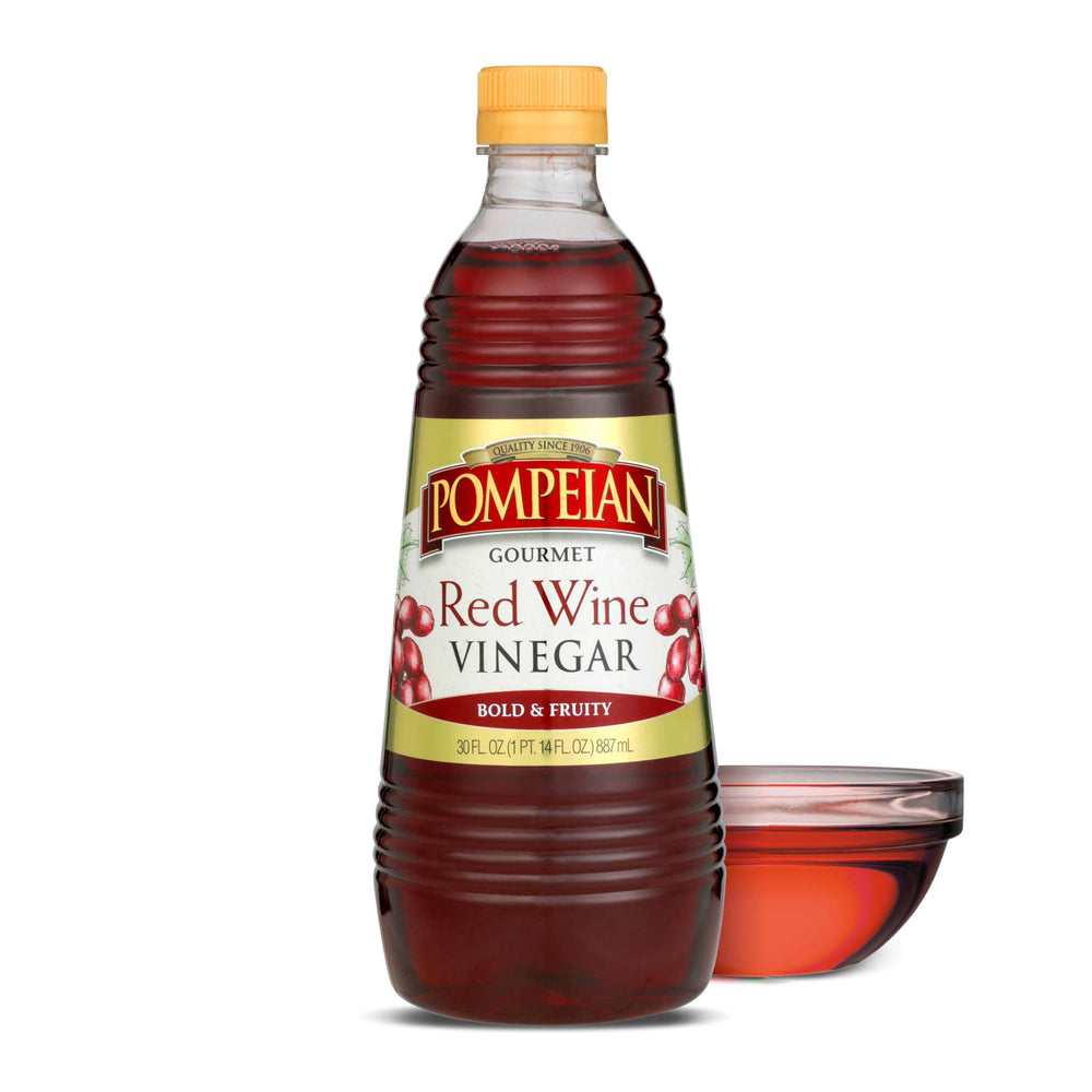 Pompeian Red Wine Vinegar bottle on kitchen counter for vibrant dressings.