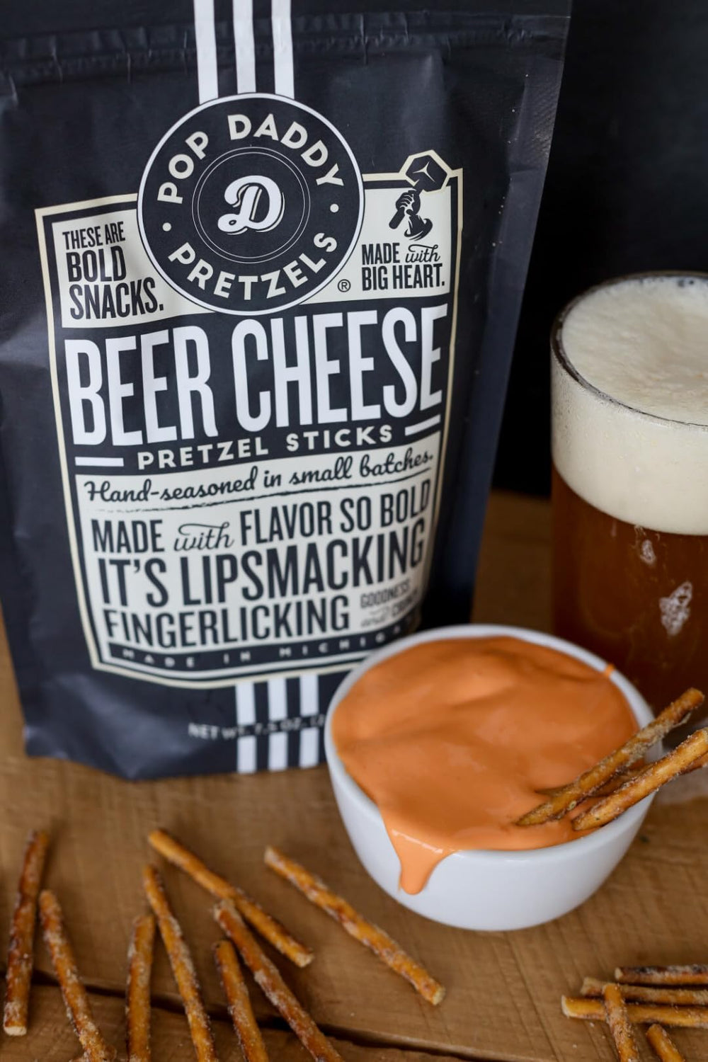 POP DADDY Beer Cheese pretzel sticks on a party platter