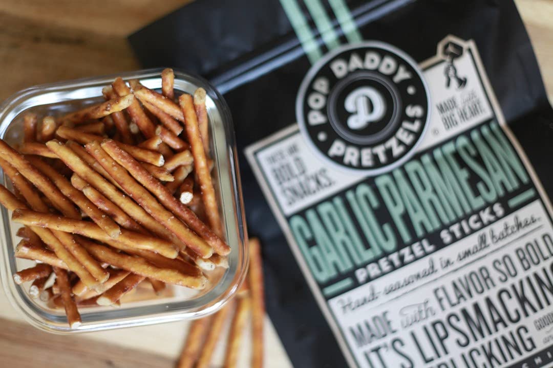Three-pack of Pop Daddy pretzel sticks in resealable bags for easy sharing