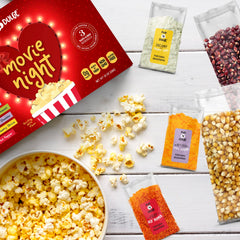 Pop n' Dulge six popcorn bags shown for microwave or stovetop prep