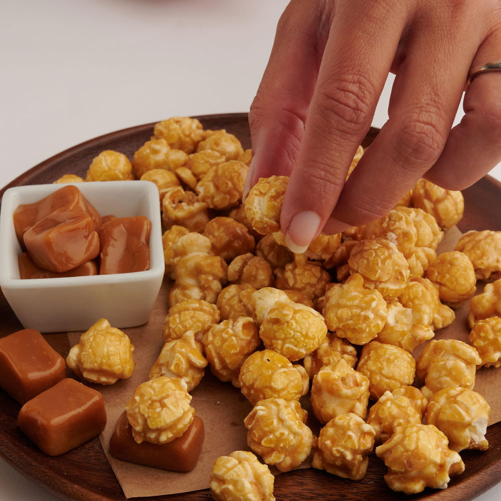 Popcornopolis Caramel Popcorn set up for a party or gathering.