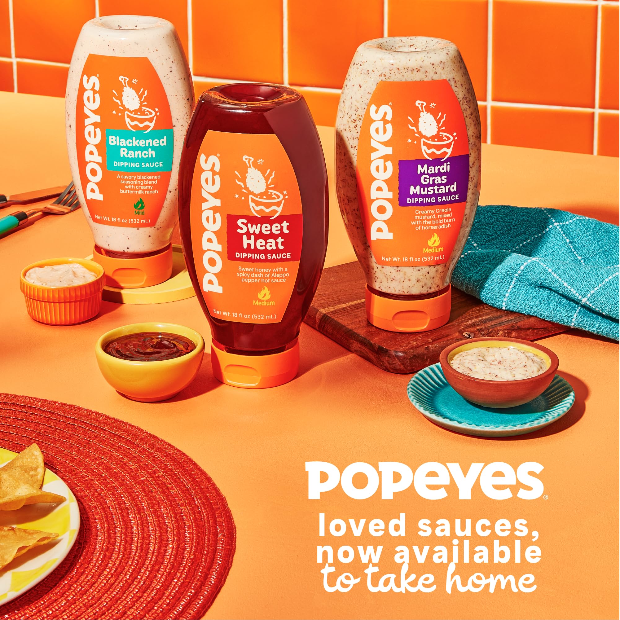 Popeyes 18oz bottle on shelf display