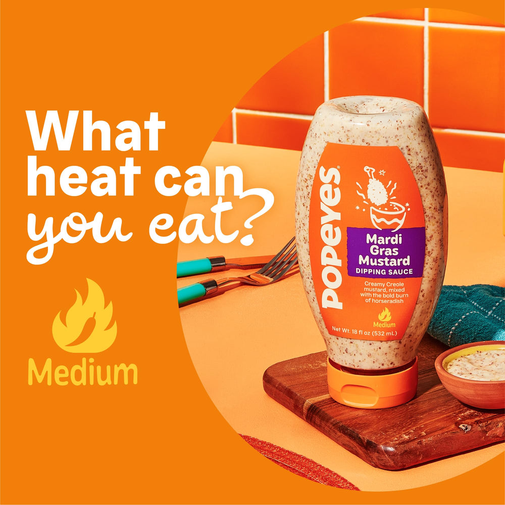 Popeyes Mardi Gras Mustard drizzle on a dish for a jazzy finish.