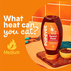 Popeyes Sweet Heat drizzled on fries for a savory upgrade