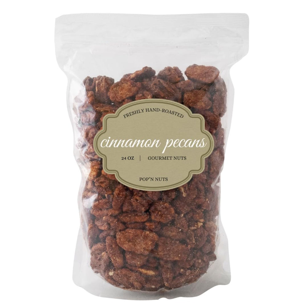 Pop’N Nuts Cinnamon Pecans bag close-up with glossy coating, premium snack on the go.