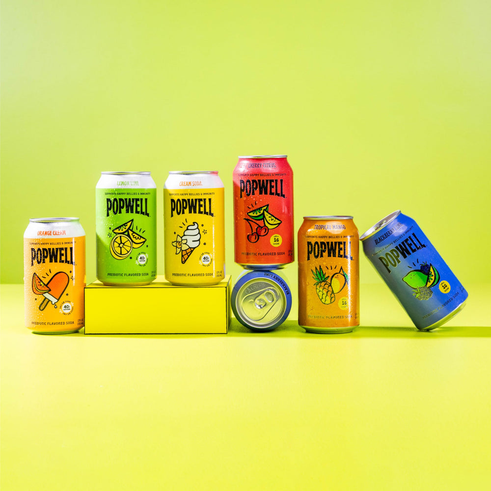 Popwell Tropical Mango can label highlighting vitamins and fiber.