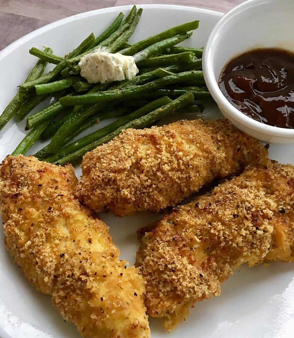 Fish sticks coated with pork rind crumbs for keto-friendly frying and flavor.