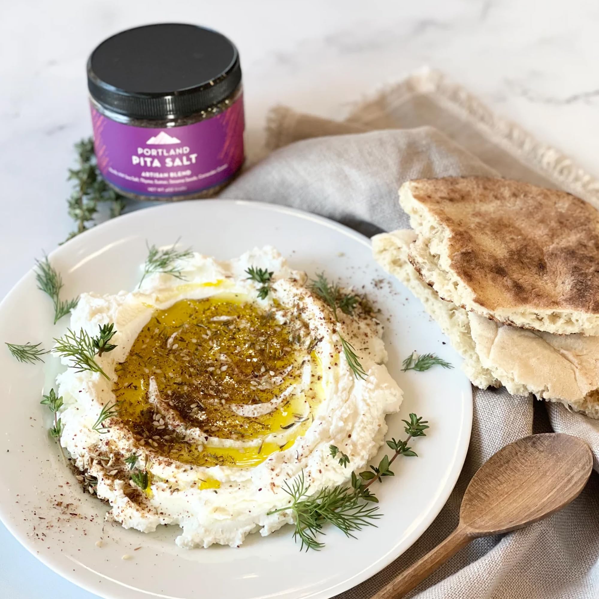 Closeup texture of Portland Salt Co Za’atar blend showing sesame seeds and thyme