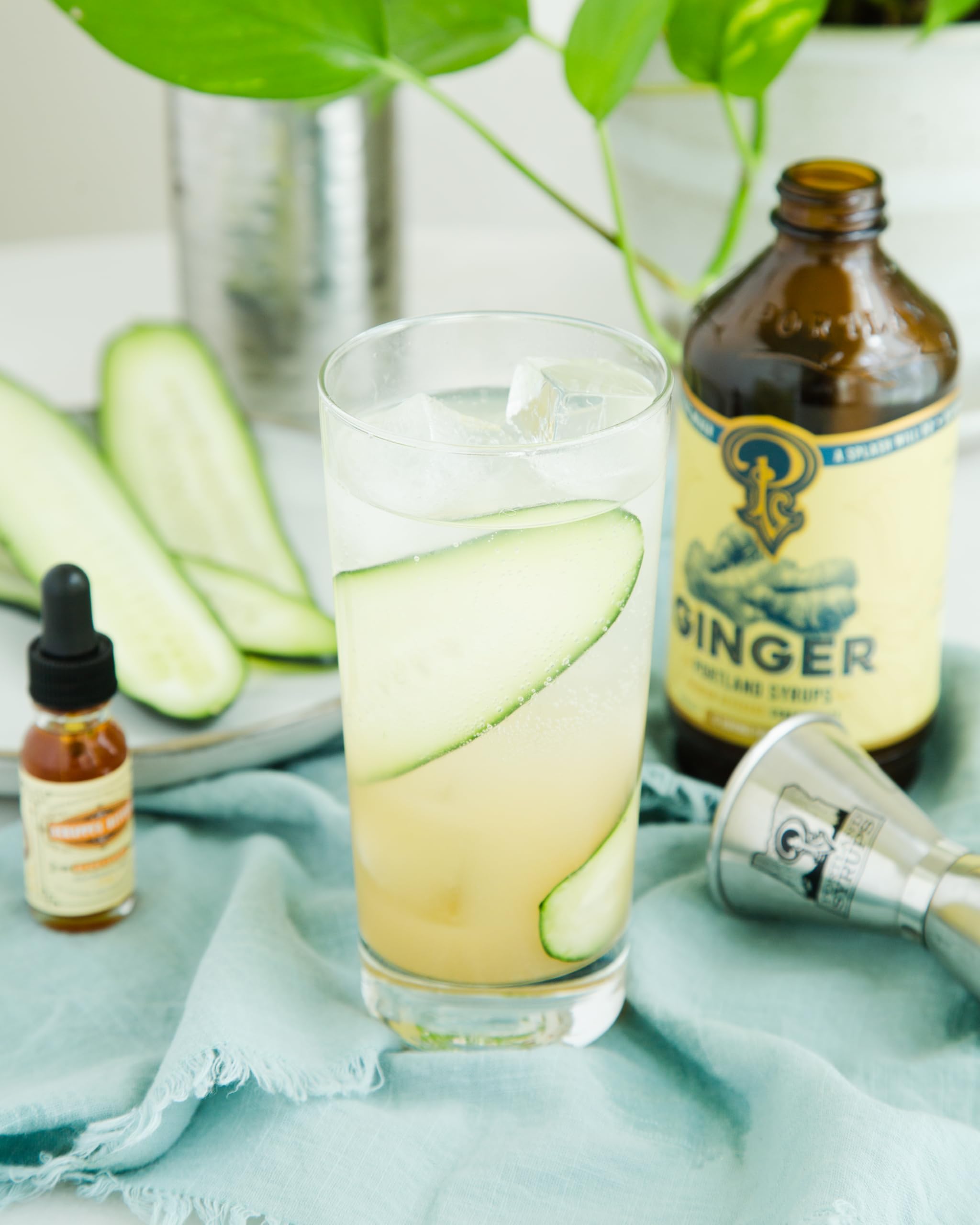 Ginger syrup with lime garnish for vibrant mocktails or cocktails.