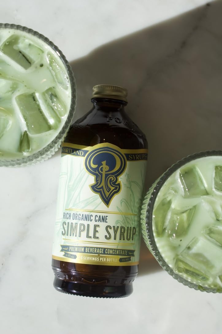 Portland Syrups bottle next to soda glass for homemade sparkling beverages