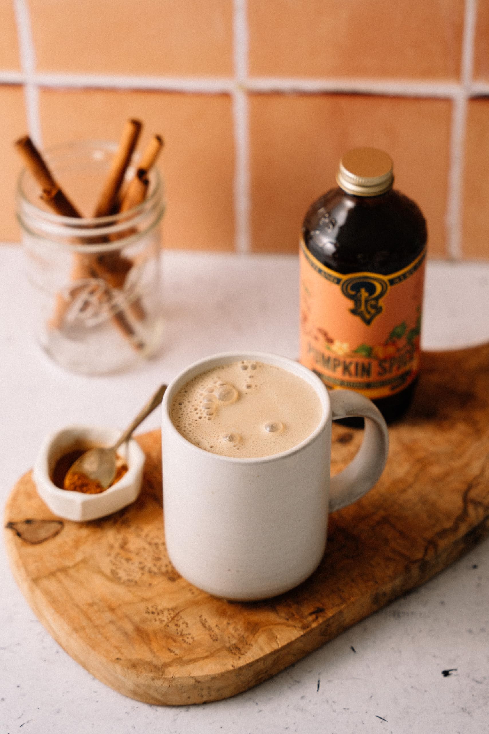 Portland Syrups Pumpkin Spice poured into coffee for a cozy latte