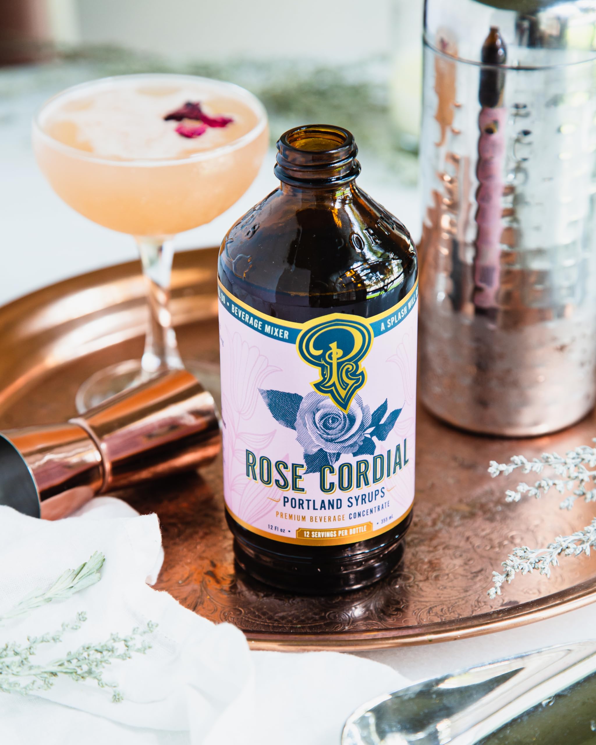 Portland Syrups Rose Cordial Syrup on a shelf display in a kitchen