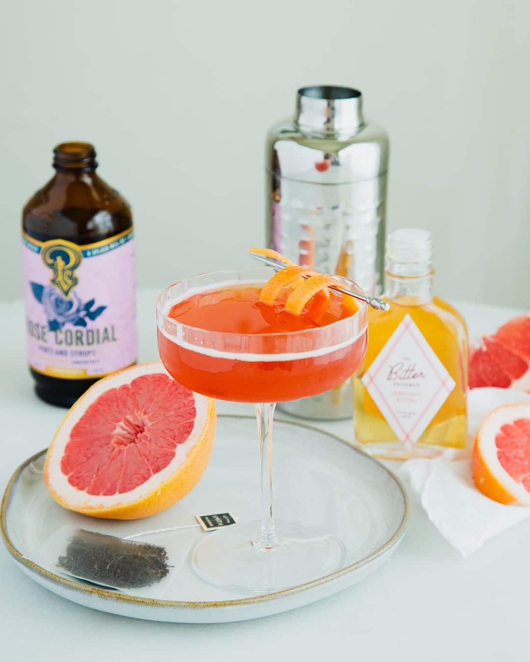 Portland Syrups Rose Cordial Syrup poured into sparkling water for a refreshing mocktail