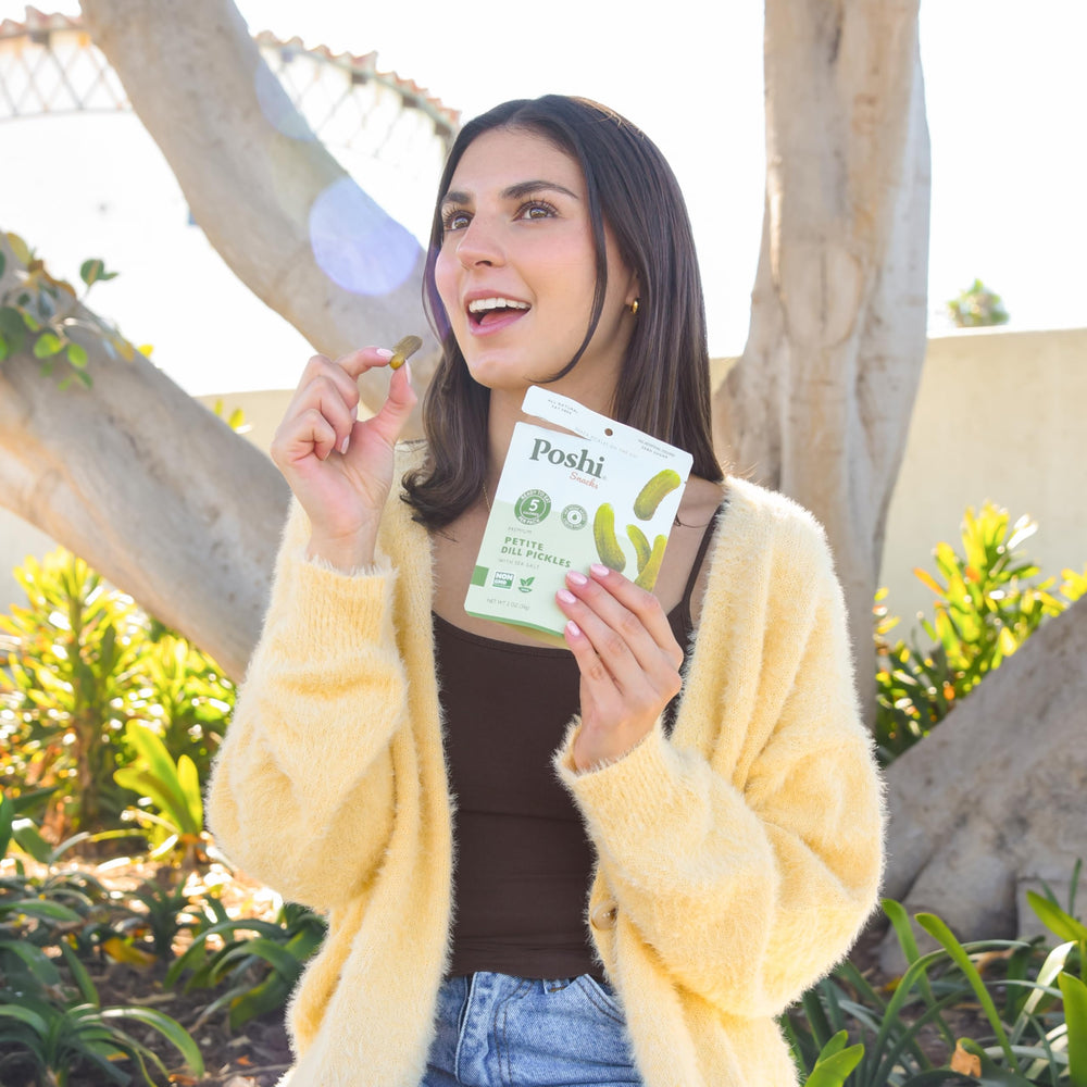 Poshi Petite Dill Pickles open pouch revealing crunchy interior