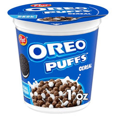 Hand holding a Post Oreo Puff Cereal Cup for on-the-go snacking