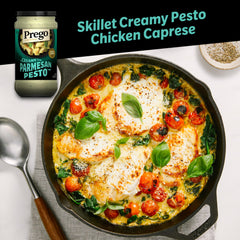 Prego Creamy Parmesan Pesto being poured over pasta coats noodles evenly.