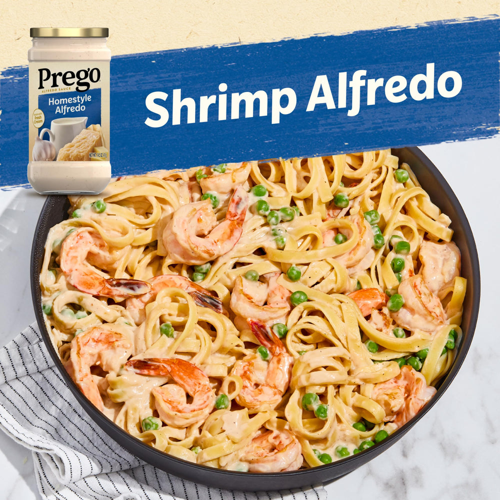 Prego Homestyle Alfredo sauce creamy texture bowl ready to coat pasta tonight.