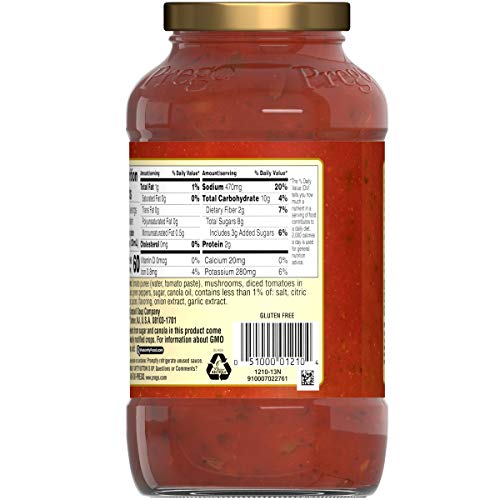 Close-up of Prego sauce ingredients showing tomato, mushroom and pepper flavors