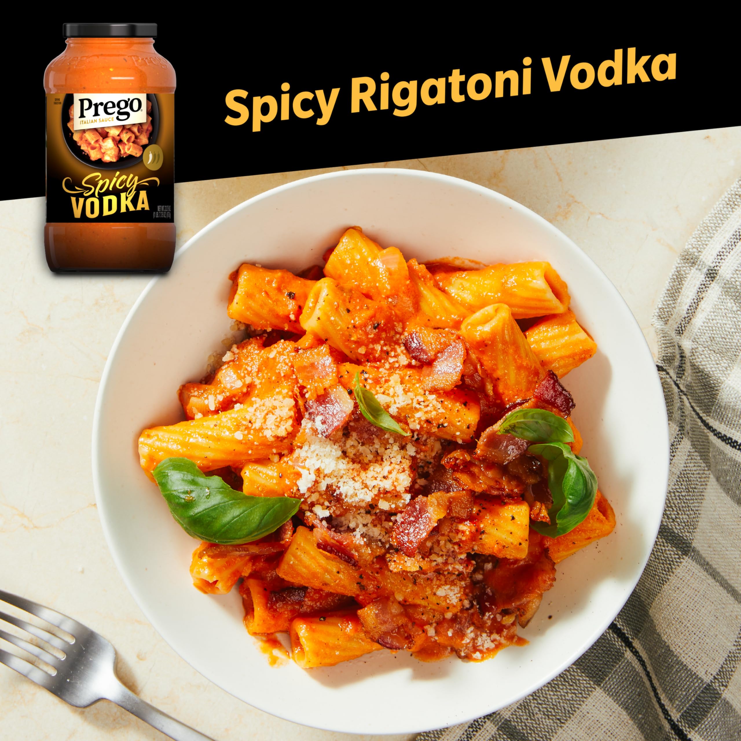 Prego Spicy Vodka Sauce pour, showcasing smooth texture for easy mixing.
