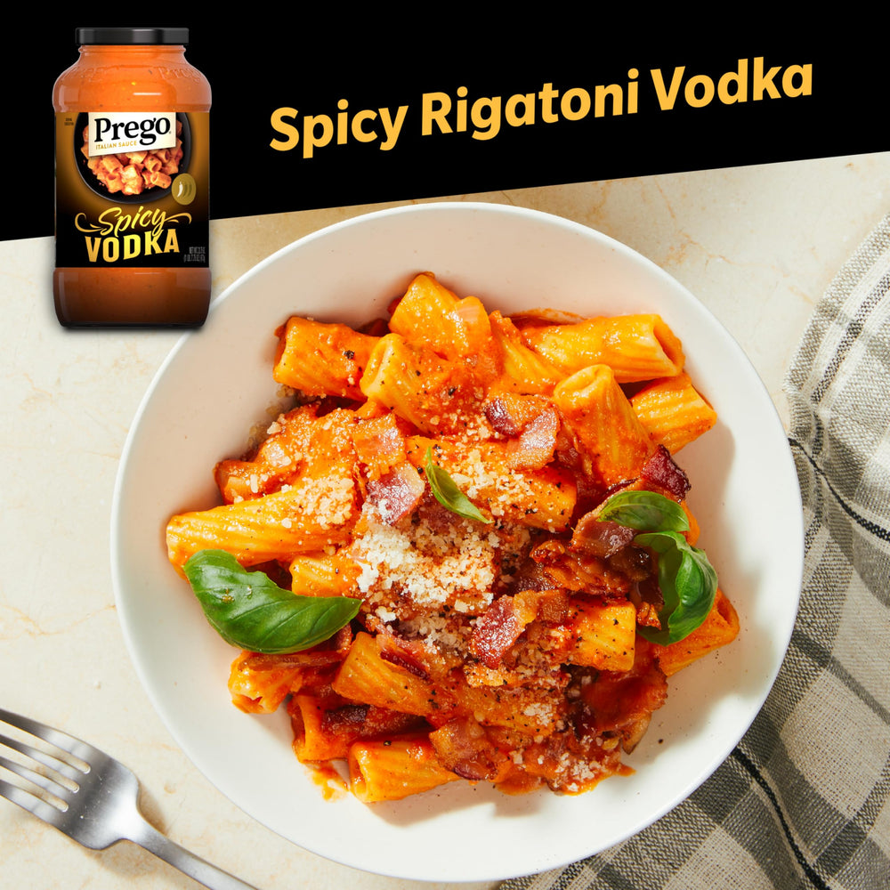 Prego Spicy Vodka Sauce pour, showcasing smooth texture for easy mixing.