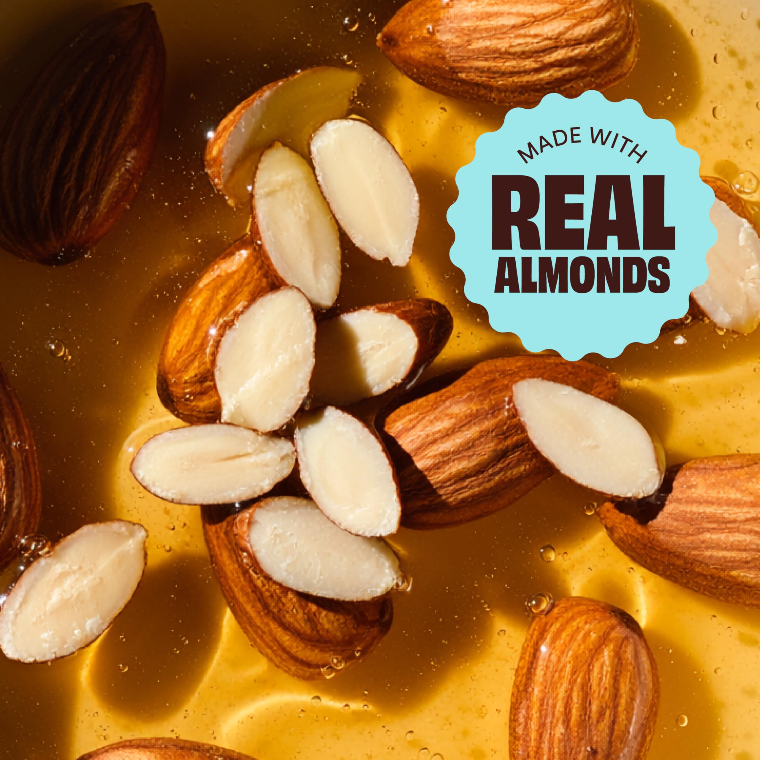 Premier Protein Honey Almond Granola poured with milk for breakfast cereal.