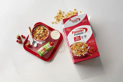 Premier Protein cereal bowl shows almond flakes and berry mix for a satisfying crunch.