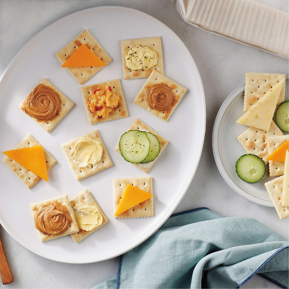 Creamy peanut butter on Premium Saltine Crackers snack