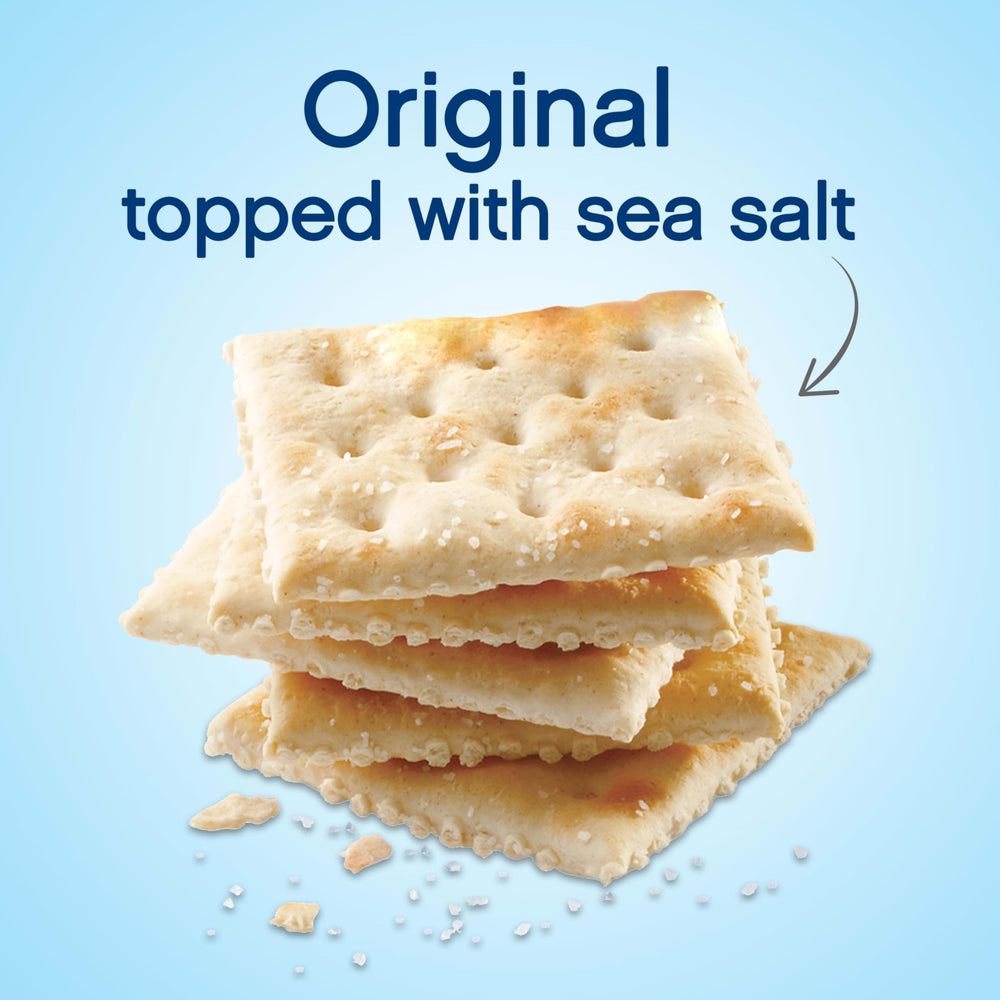 Cracker topped with cheese using Premium Saltine Crackers