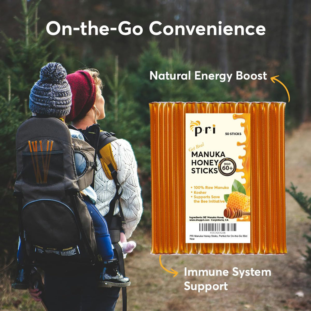P.R.I Manuka honey sticks being poured into a cup for tea.
