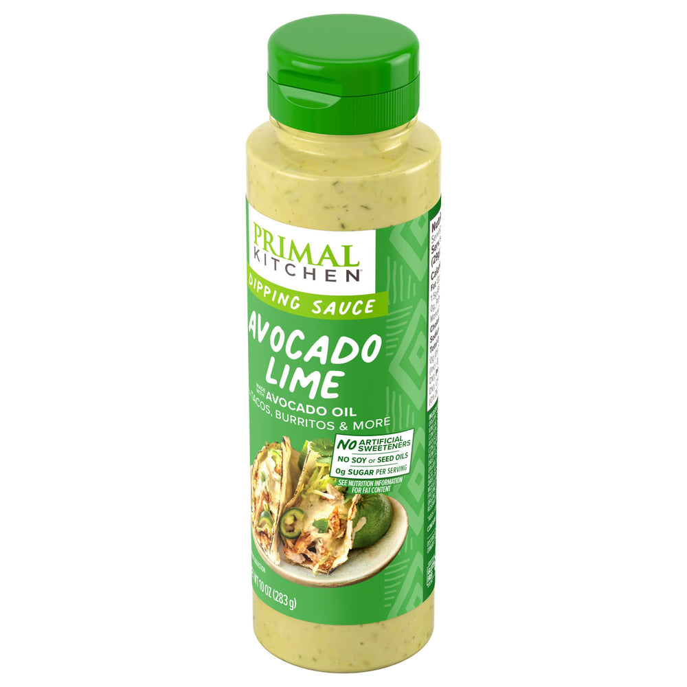 Primal Kitchen Avocado Lime Sauce Dip in bowl with salad greens