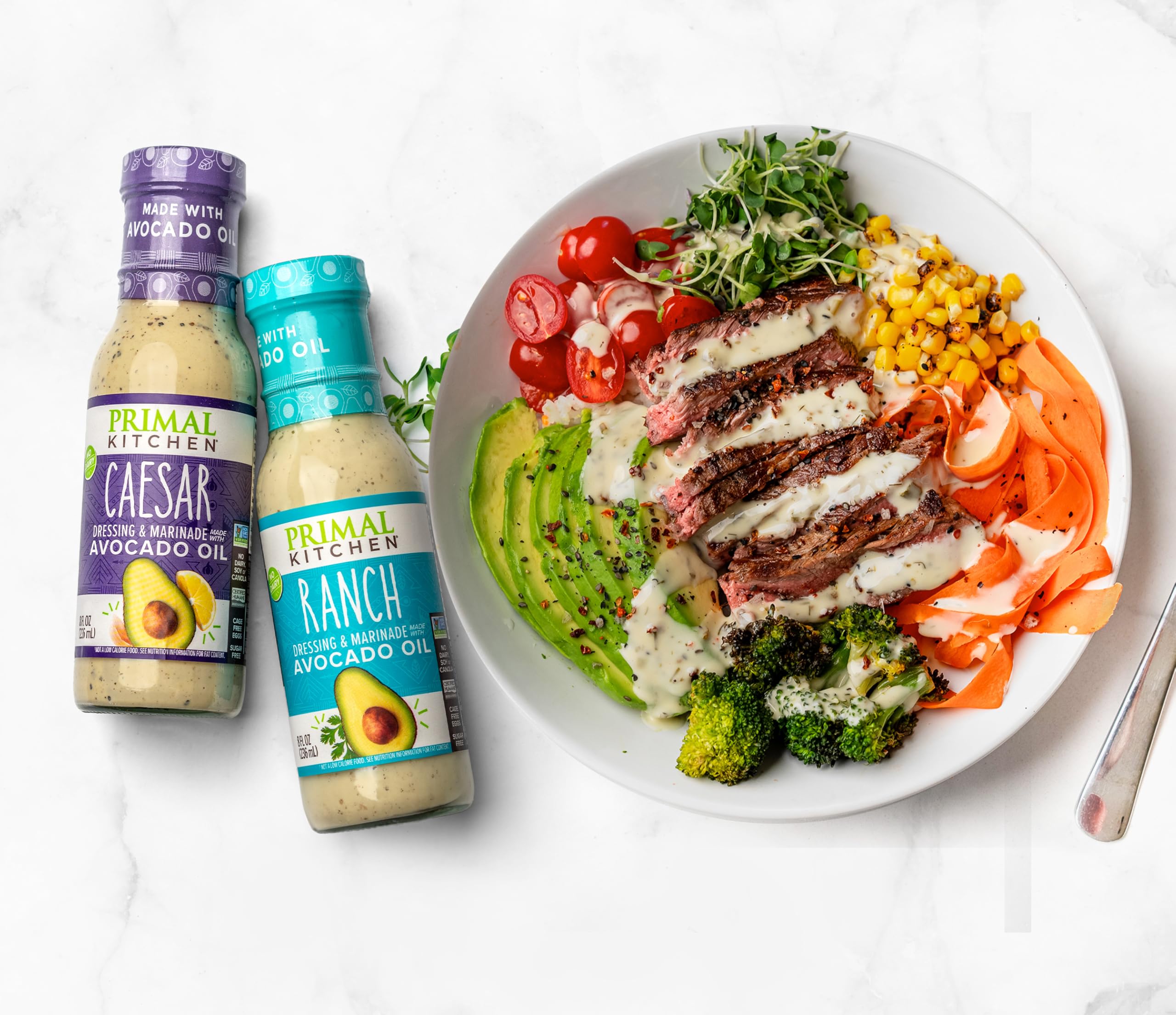Primal Kitchen avocado oil bottle highlight; premium fats for keto marinades.