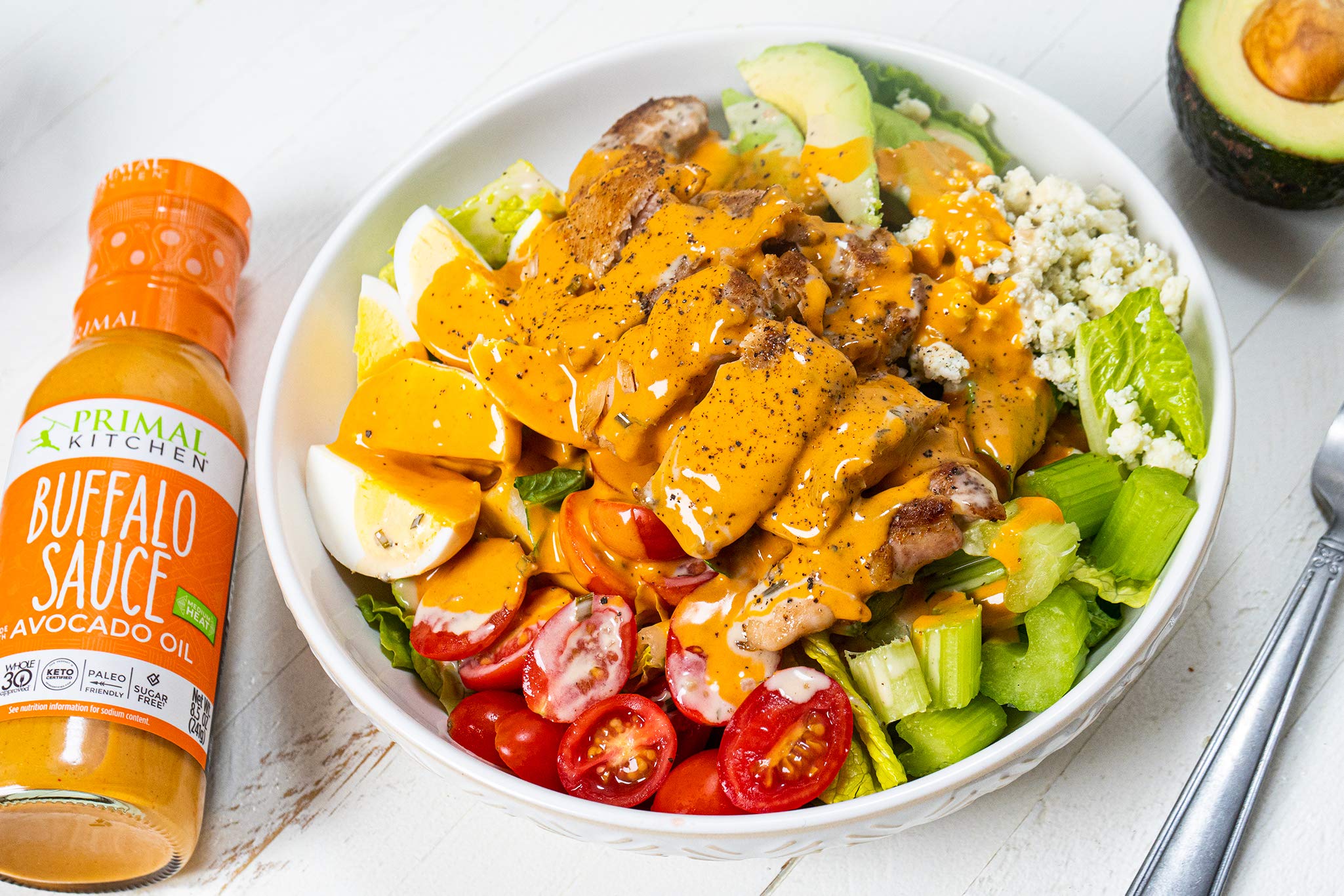 Primal Kitchen Buffalo Sauce burrito-drizzle, creamy heat without dairy.