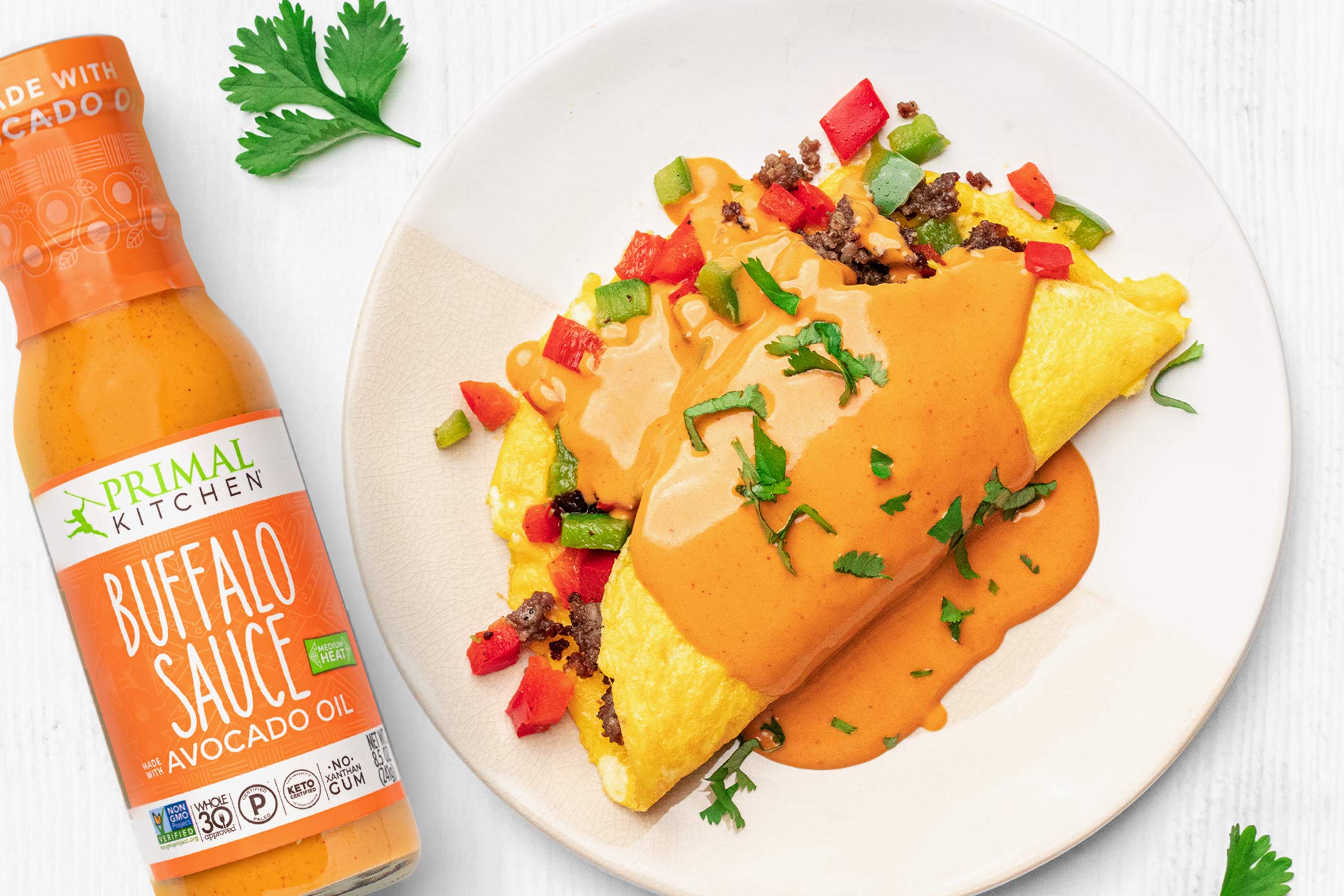 Primal Kitchen Buffalo Sauce dip-bowl, dairy-free dip with bold buffalo flavor.