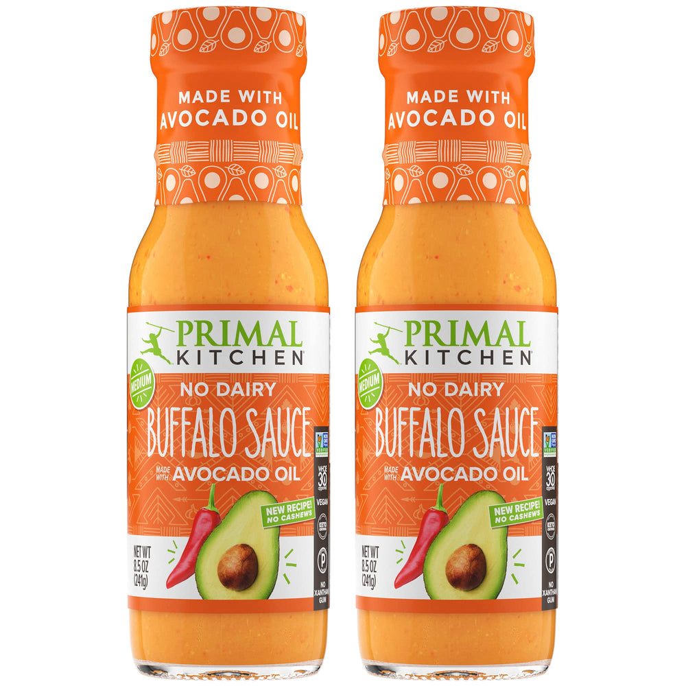 Primal Kitchen Buffalo Sauce two-pack bottles, dairy-free bold flavor for wings.