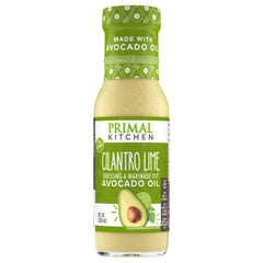 Primal Kitchen Cilantro Lime Dressing bottle ready to drizzle on salads.