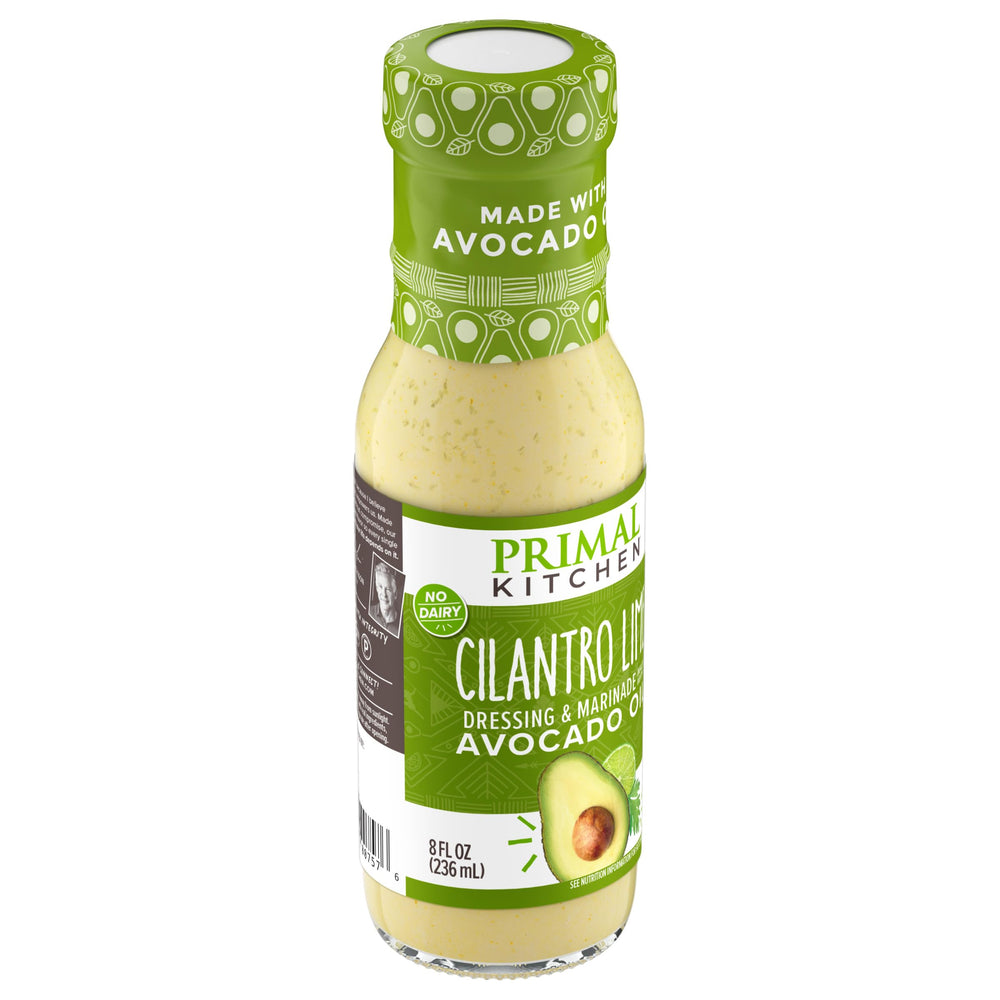 Primal Kitchen Cilantro Lime Dressing on grilled chicken marinade setup.